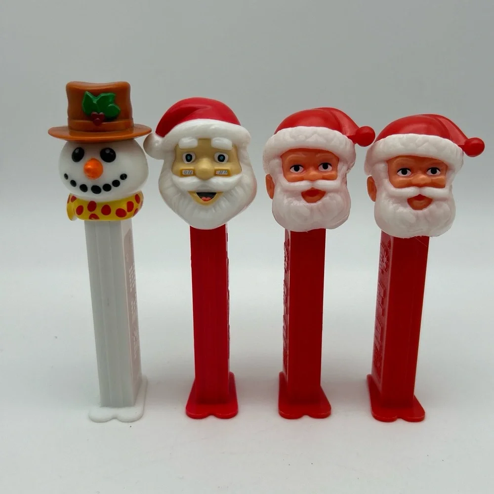 Lot Of 4 Vintage PEZ Candy Dispensers Santa Clause And Snowman